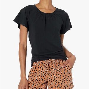 Cape sleeves and fitted black tee, buttons in back, dressy